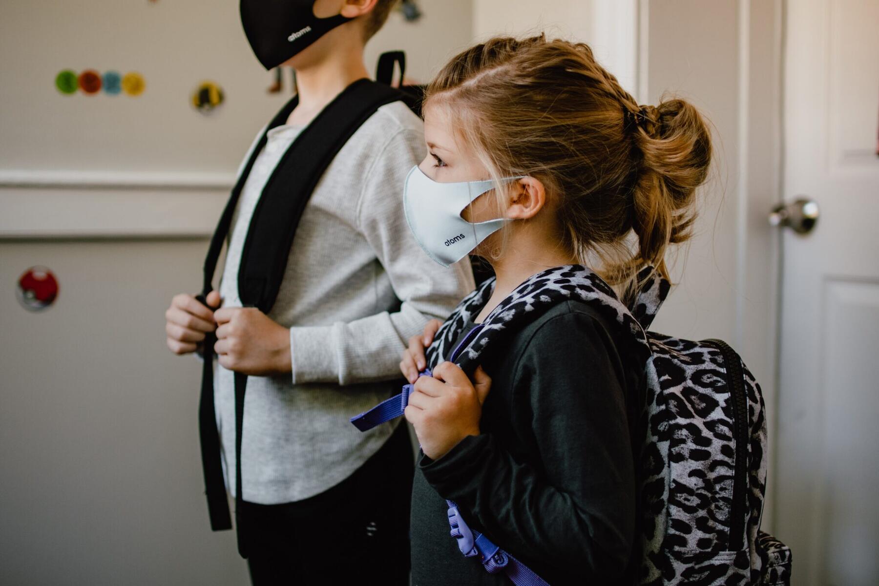 Child wearing a mask at school.